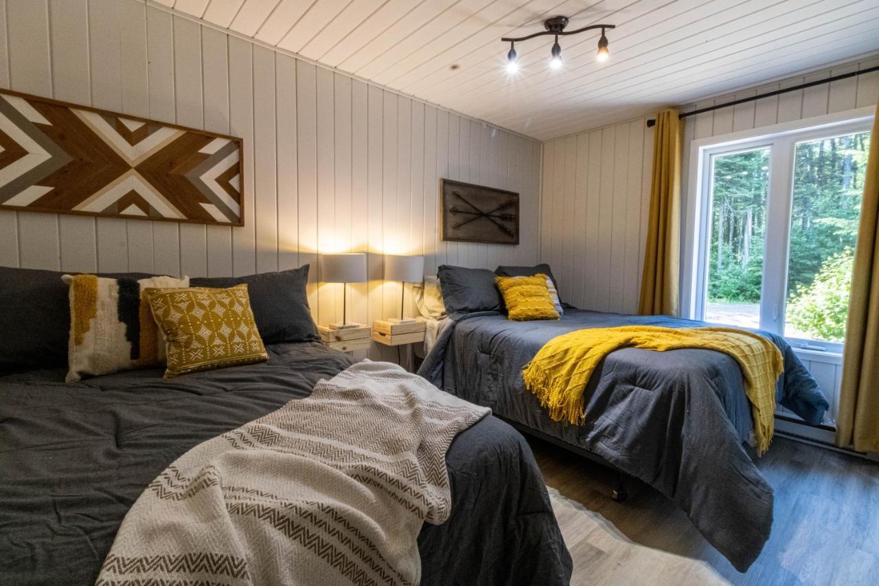 Les Chalets Tourisma - Chalet Dans Les Bois Avec Lac Prive - Le Colibri Saint-Raymond Bagian luar foto